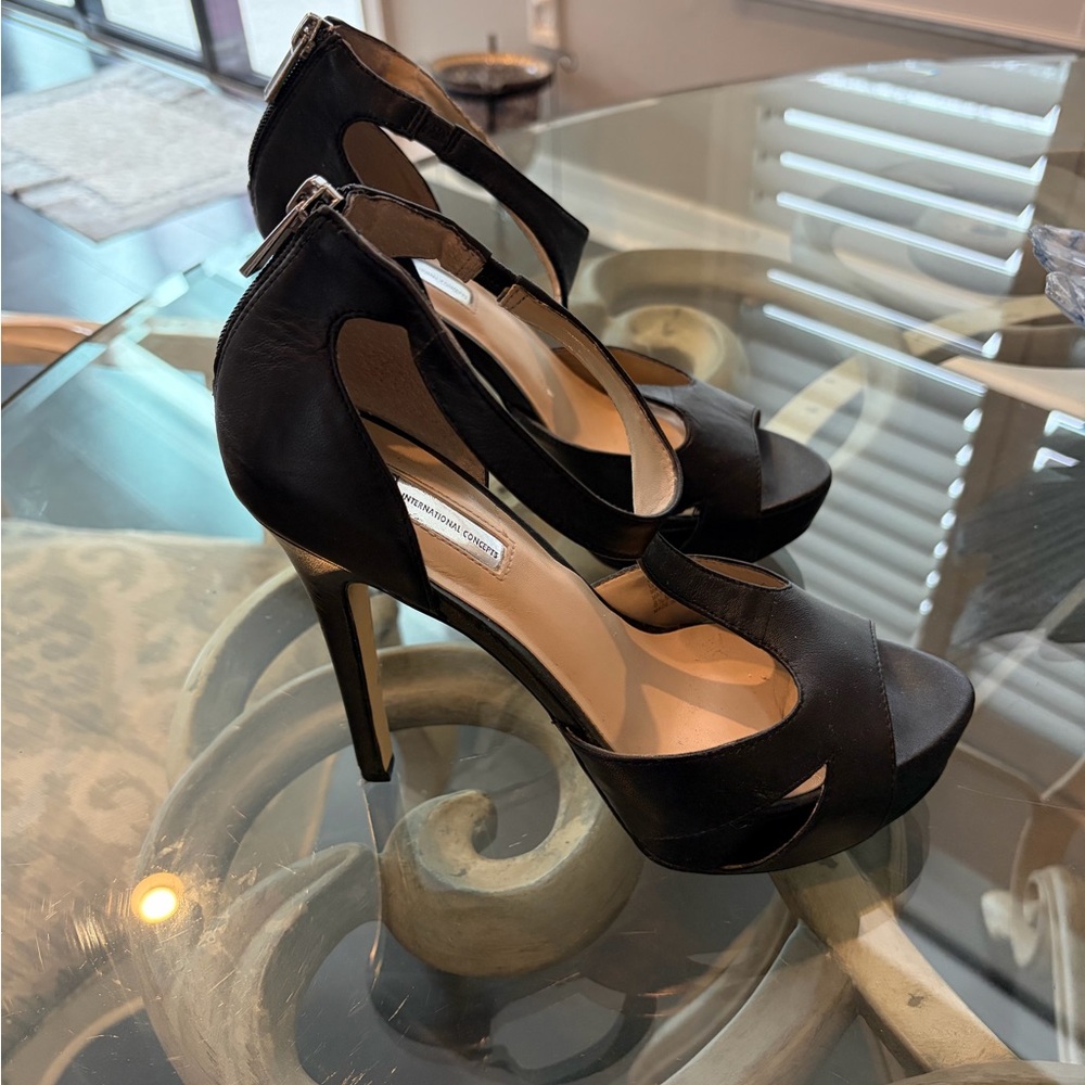 INC black leather platform open toe sandals.